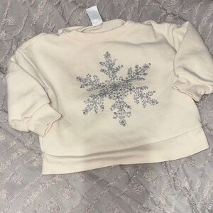 Cream Sweatshirt with Silver Snowflake Design
